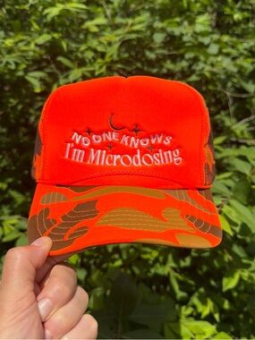 No One Knows I'm Microdosing Orange Trucker Hat